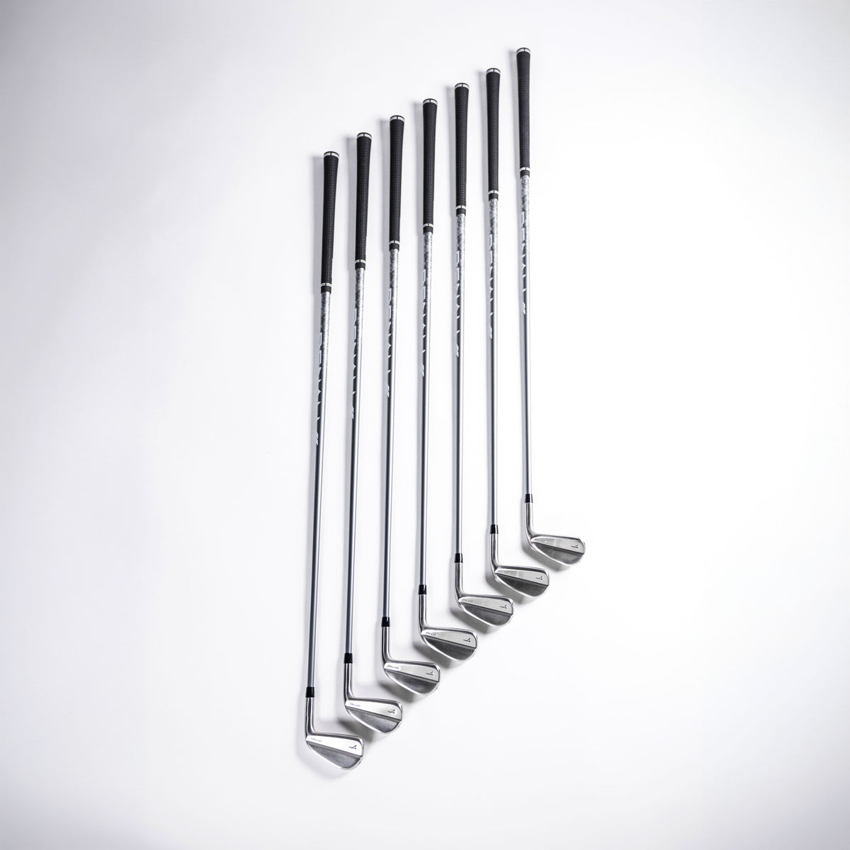 Takomo 201T MKII Golf Iron Set assembled with Denali shafts photographed on a white background.