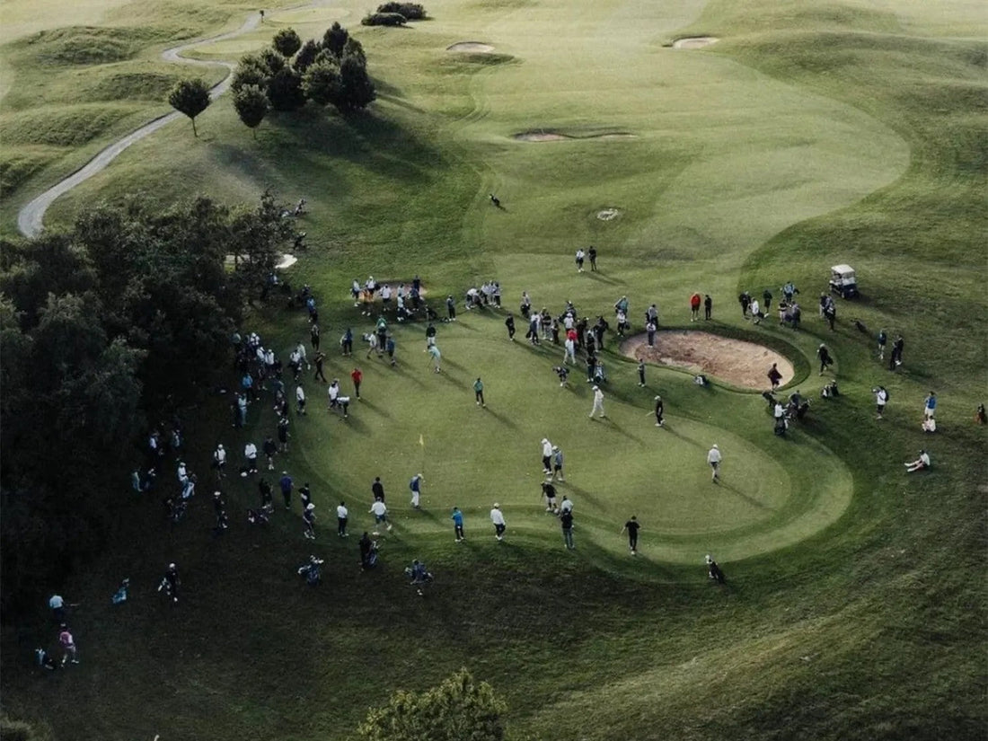 Golf course hole showing what is a fairway in golf leading to the green