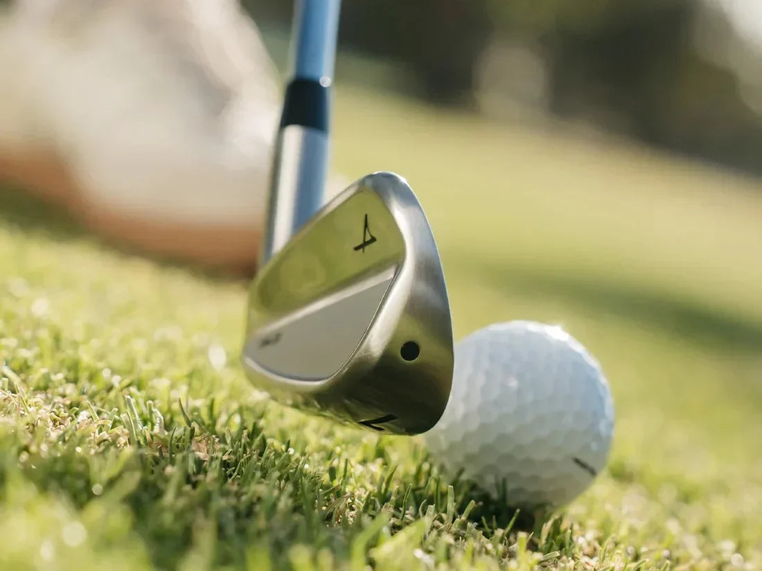 photo of takomo 101 mkii iron at address behind ball to leverage moment of inertia in golf