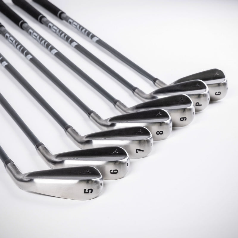 Close-up of Takomo 101 MKII Golf Iron Set on a white background.