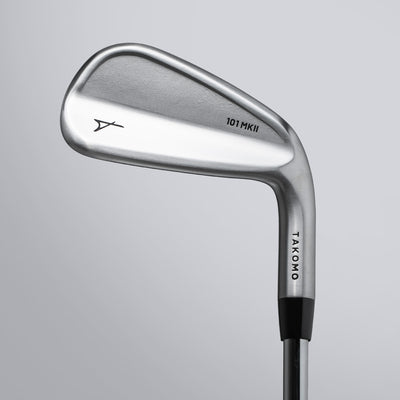 Golf club head with 'Takomo' branding on a gray background