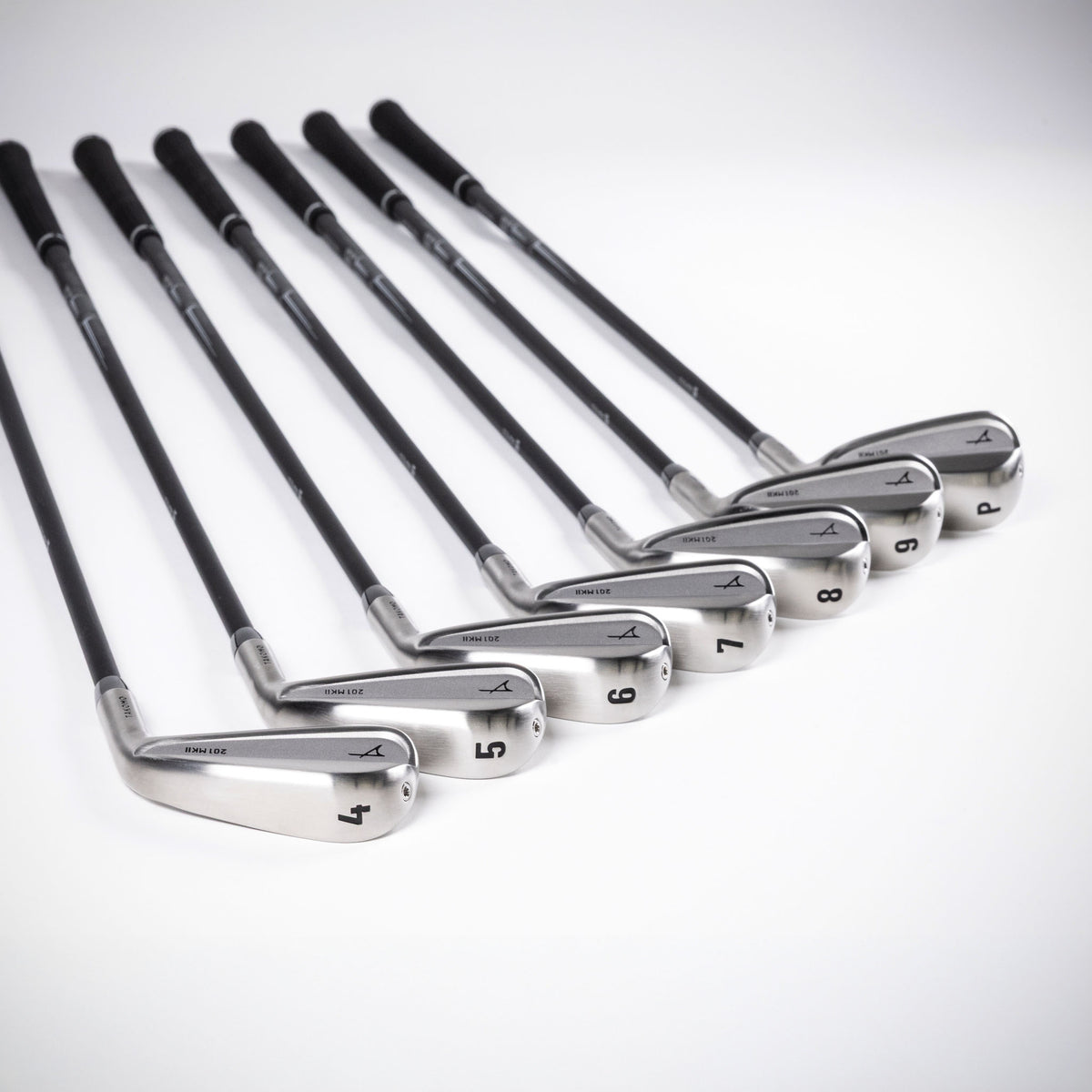 Close-up of Takomo 201 MKII Golf Iron Set on a white background.