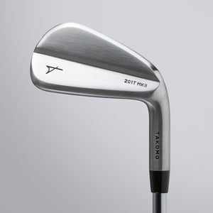 Golf club head with 'Takomo' branding on a gray background