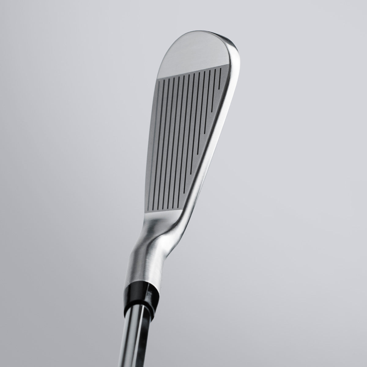 Golf club head on a gray background