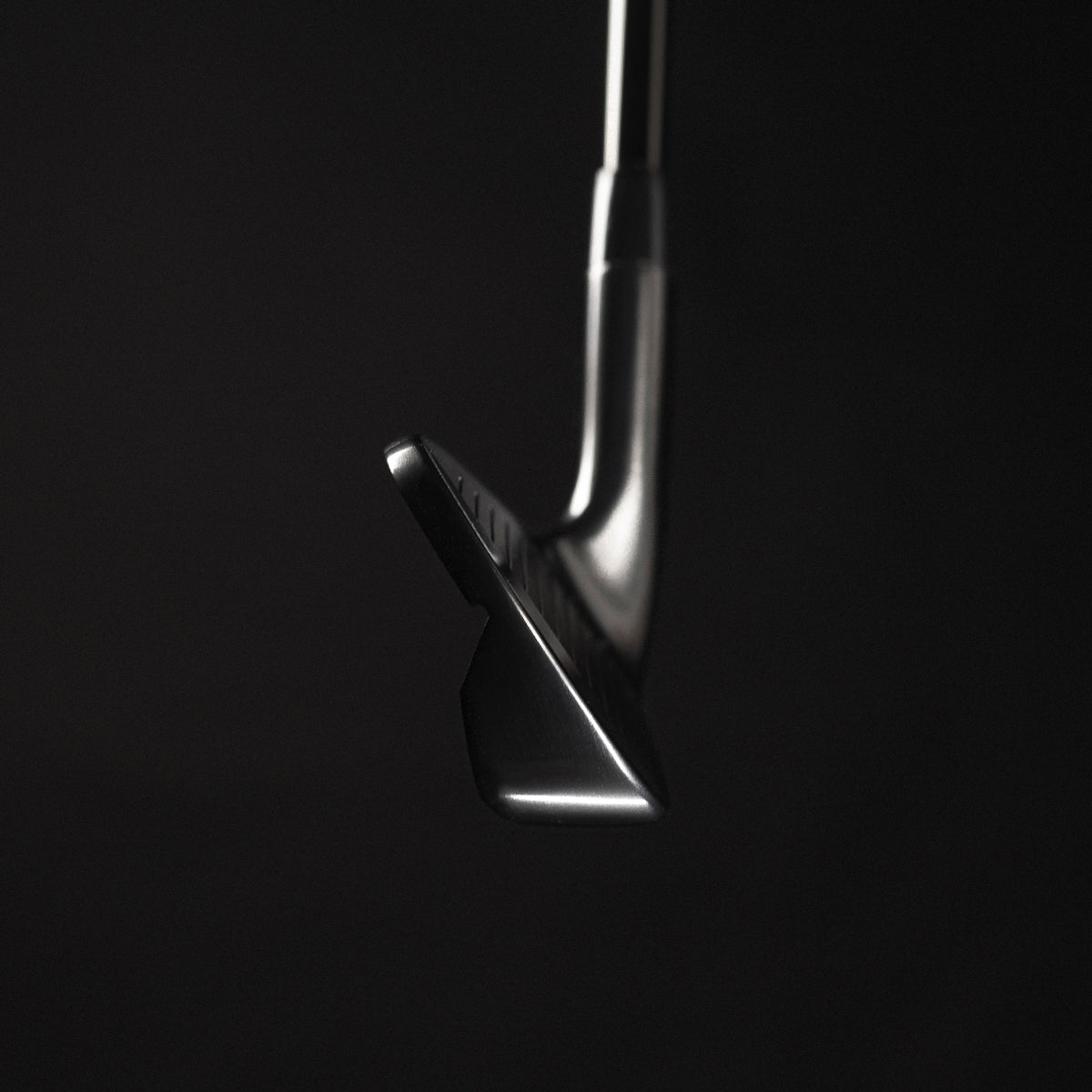 Close-up of the black Iron 301 CB on a black background