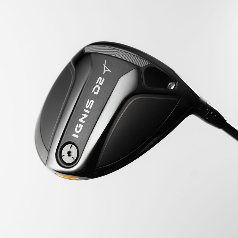 A close-up studio shot of a Takomo IGNIS D2 golf driver on a light gray background, showcasing branding and details on the bottom of the club head.
