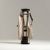 White golf bag with black accents on a light gray background