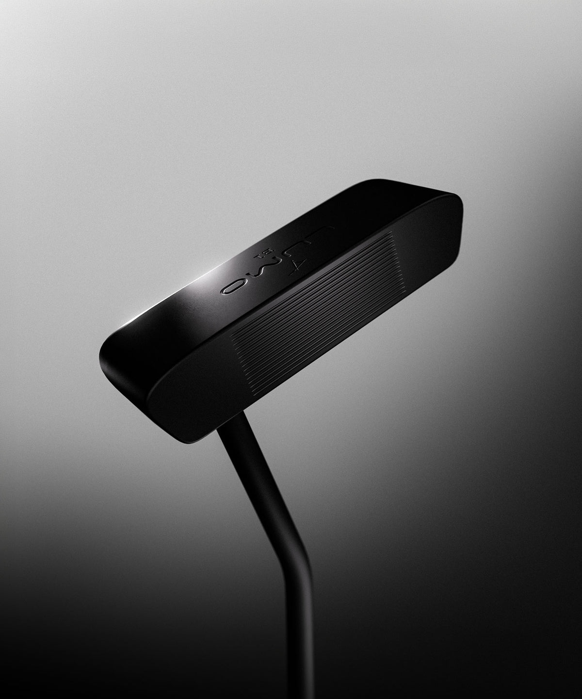 Product render depicting Takomo LUMO B1 putter in Black DLC color against dark gray background.