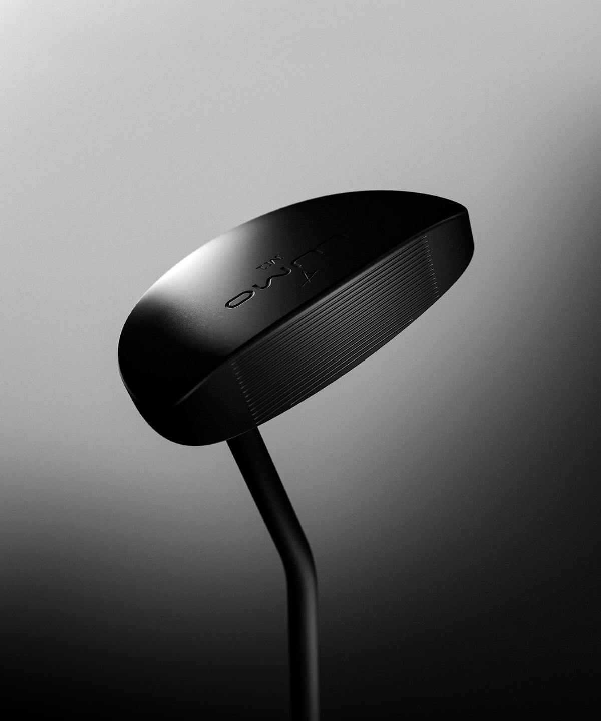 Product render depicting Takomo LUMO M1 putter in Black DLC color against dark gray background.